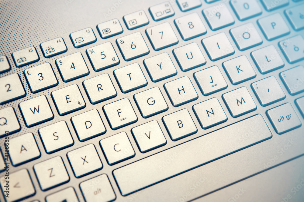 keyboard blue an yellow light effect, technology concept
keyboard blue an yellow light effect, technology concept