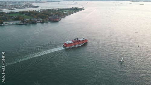upper bayGovernors Island Picnic Point water transport ship in sunset orange golden hours