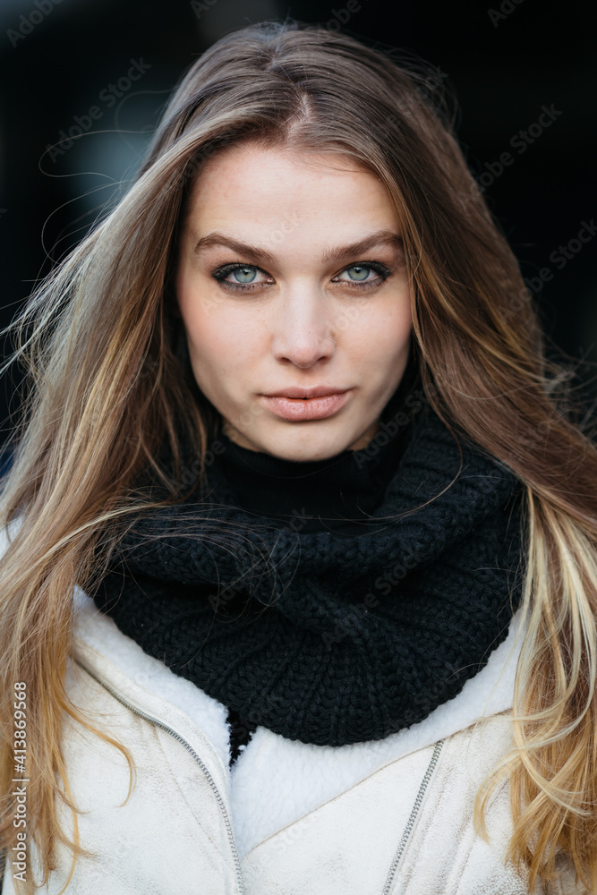 Close-up portrait of young beautiful woman wearing black scarf Close-up portrait of young beautiful woman wearing black scarf