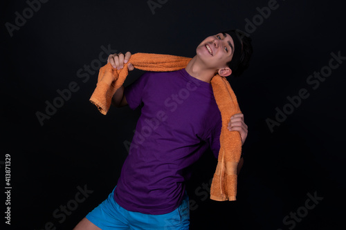 Funny young man and retro style. Sports and recreation. Bright colors. Black background.