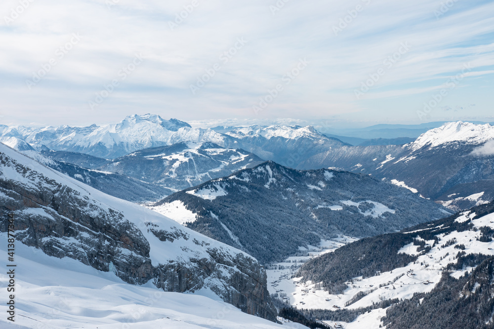 snow covered mountains in the aravis, french alps