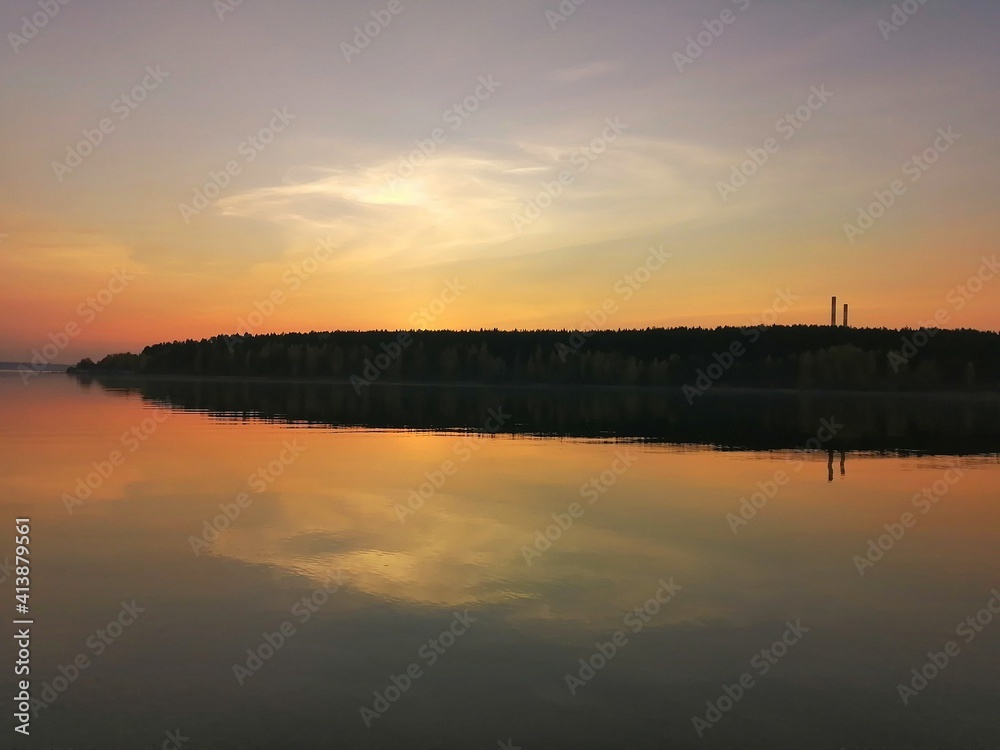 Obraz premium sunset over the river