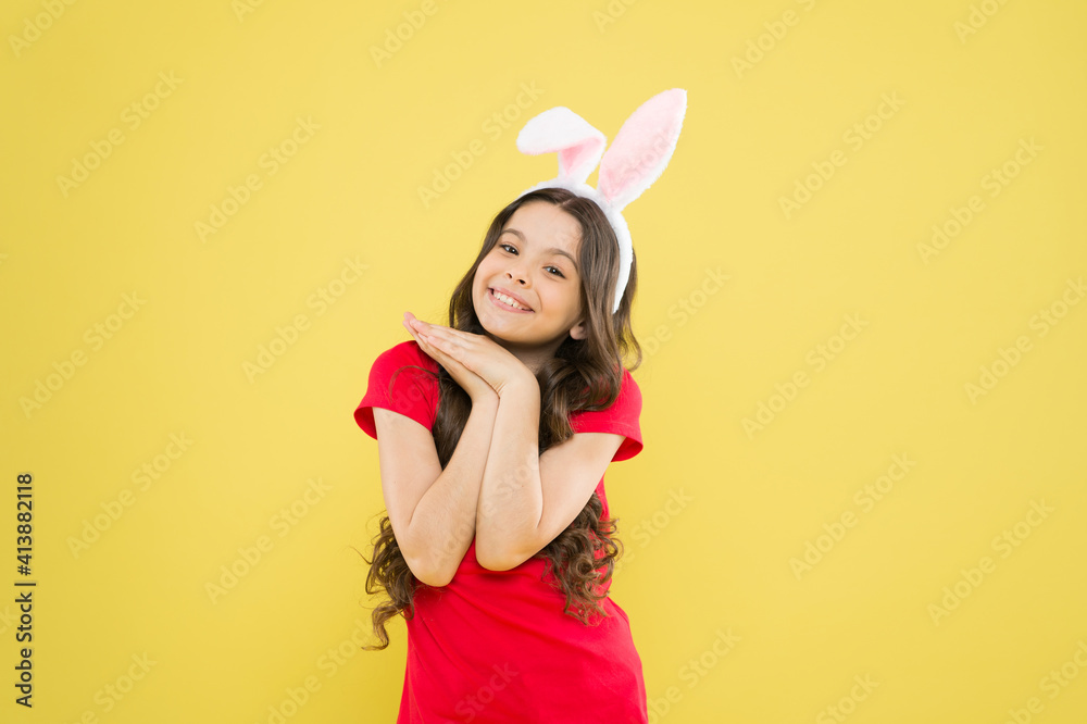 dreaming about presents. Cheerful kid celebrate easter holiday. spring holiday tradition. girl have fun. celebrate traditional feast. Easter bunny costume. little girl in rabbit ears. happy childhood