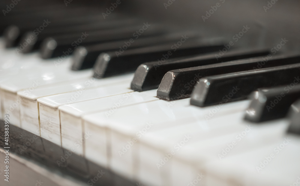 black and white keys of an old vintage piano