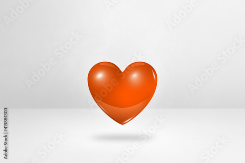 3D orange heart on a white studio background