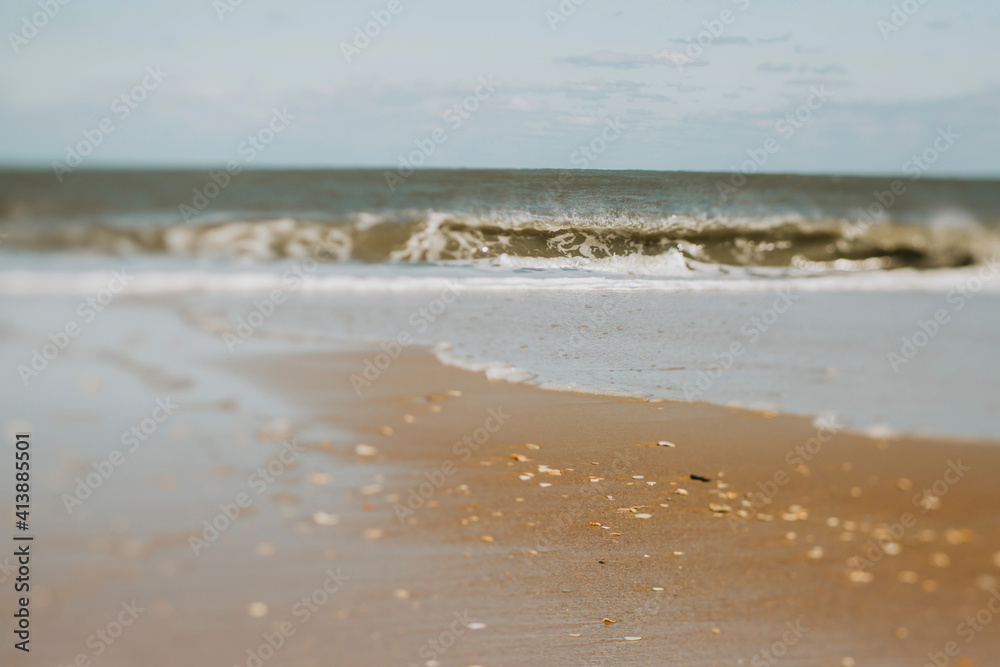 Scenic view of sea against sky during sunny day Scenic view of sea against sky during sunny day