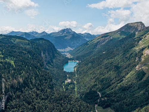 Lake of Montriond surrounded by mountains in summer, Morzine, les Portes du Soleil, France