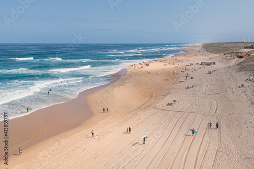 Les casernes beach in the summer with people surfing - aerial, seignosse, landes, france