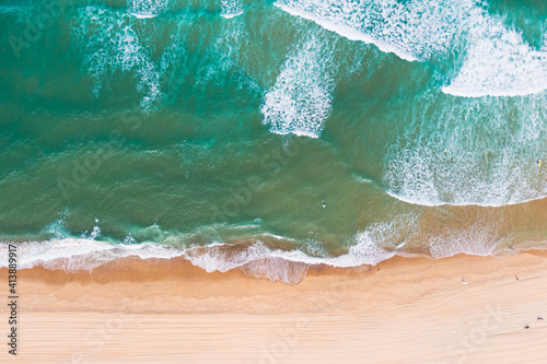 Birds eye view of the ocean, waves and sand, seignosse, landes, france