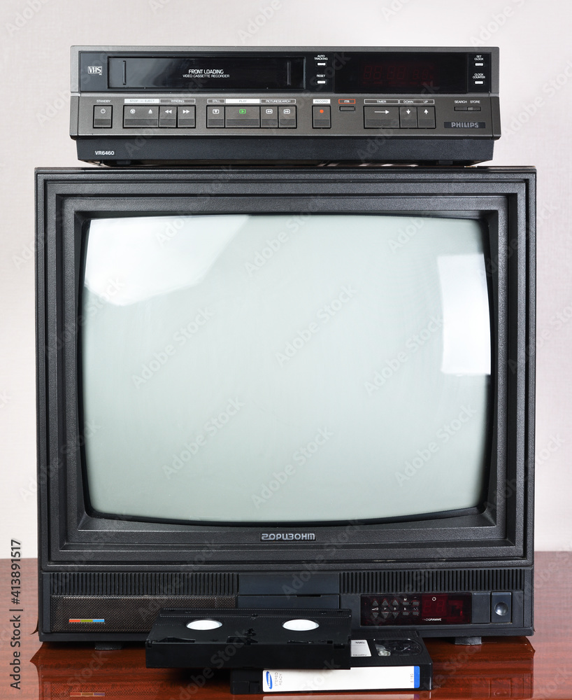 Berlin, Germany 01.08.2021: Old black HORIZONT TV with built-in and vintage  Philips VR6460 video recorder from 1980s, 1990s, 2000s with wallpaper.  Stock Photo | Adobe Stock