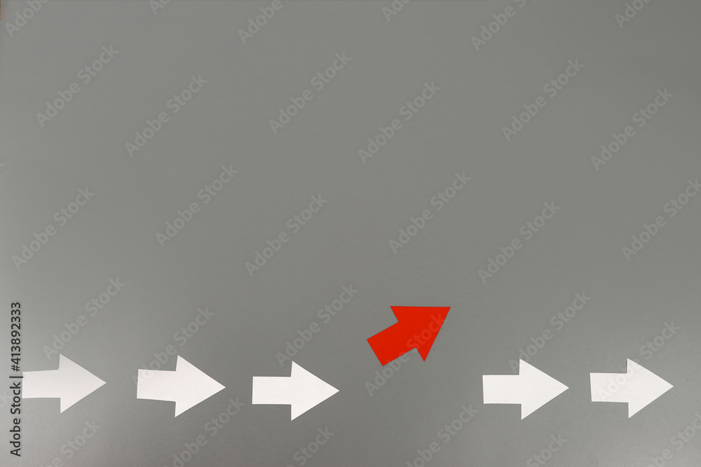 Red arrow changing direction. The concept of new ideas, business, startup, leadership. Copy space for text Red arrow changing direction. The concept of new ideas, business, startup, leadership. Copy space for text