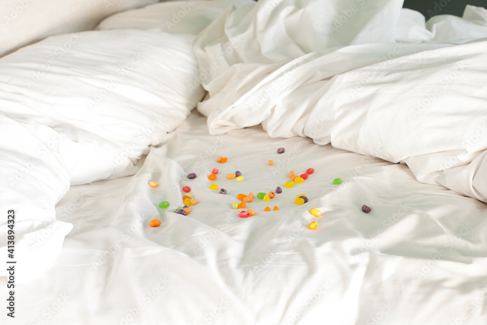 High angle view of colorful candies on bed High angle view of colorful candies on bed