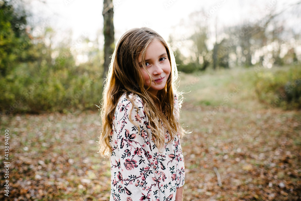 Portrait of confident girl standing at park Portrait of confident girl standing at park