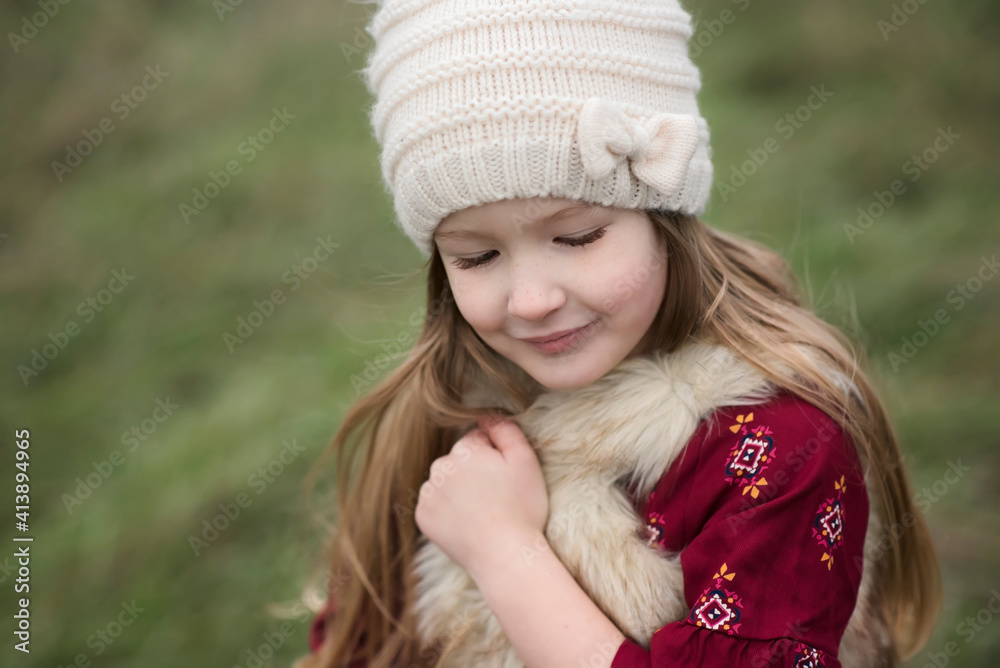 Cute girl wearing warm clothing at park Cute girl wearing warm clothing at park