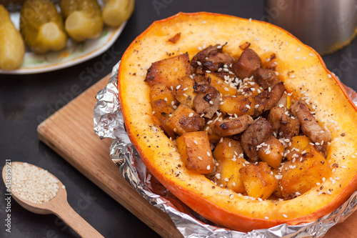 Pumpkin stuffed with meat and vegetables. Healthy eat concept.