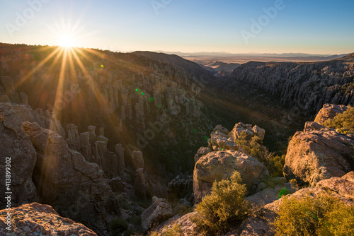 Scenic view of mountains against clear sky during sunset photo