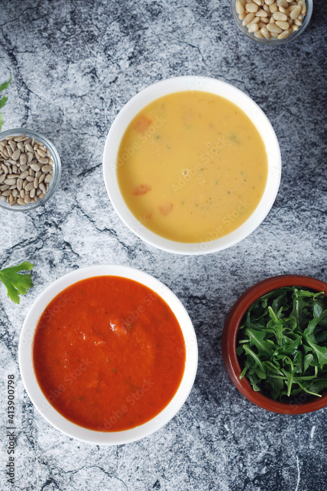 Overhead view of vegetable soup served in bowls on table Overhead view of vegetable soup served in bowls on table