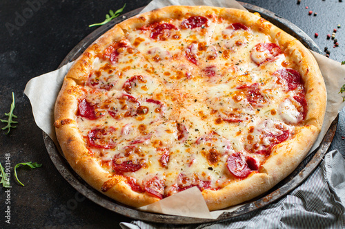 pizza pepperoni or salami meat sausage and double cheese fast food Takeaway ready to eat on the table meal snack outdoor top view copy space for text food background rustic image