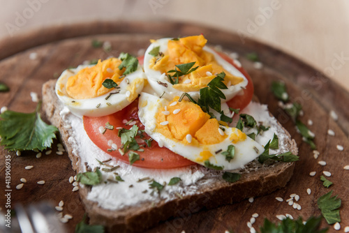 Close up scene on diet sandwich with eggs and tomato