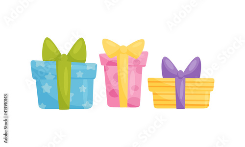 Gift Boxes Wrapped in Paper and Tied with Ribbon as Holiday Symbols Vector Set