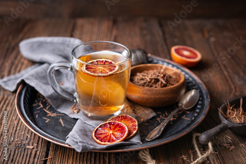 Medicinal Pau d'Arco bark tea also known as Lapacho in a glass cup photo
