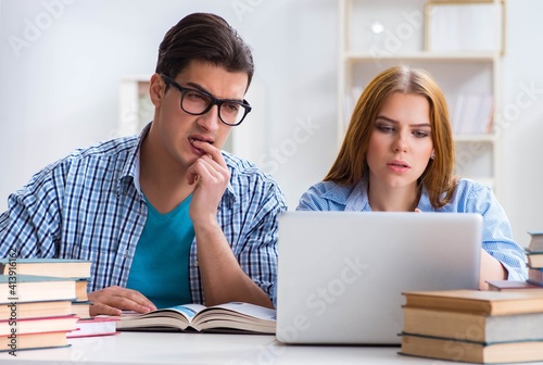 Two students preparing to school exams