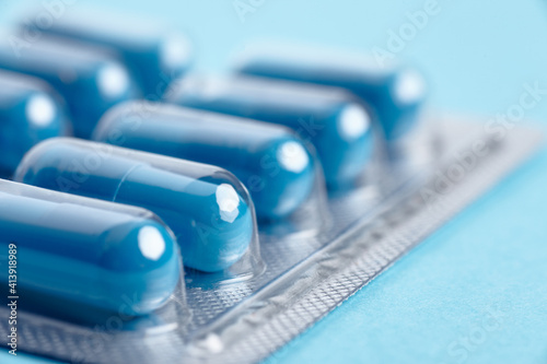 Blister pack of blue medicine pills. photo