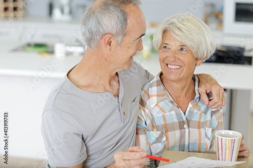 elderly couple with renovation tools