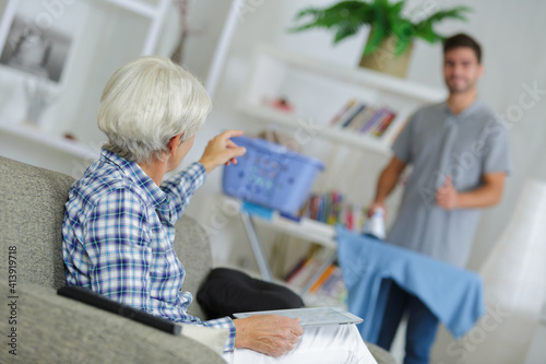 young social work assistant takes care of a senior woman