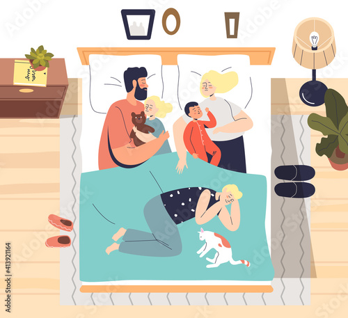Parents sleeping with little kids in one bed. Big family having nap together hugging