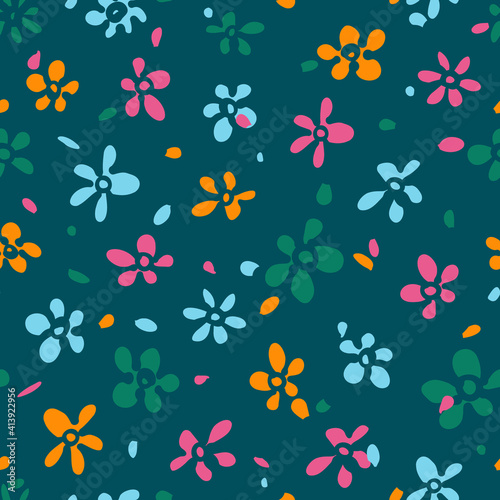 Multicolor random placed abstract vector flowers seamless pattern cropped with green background.