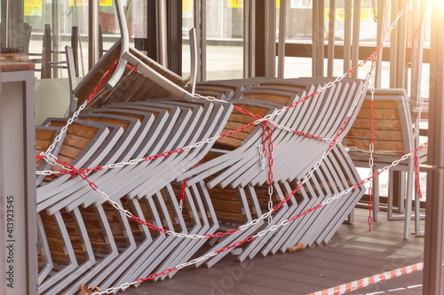 Covid 19 and a closed restaurant with chairs and tables because of lockdown or shutdown in frankfurt, germany 2021