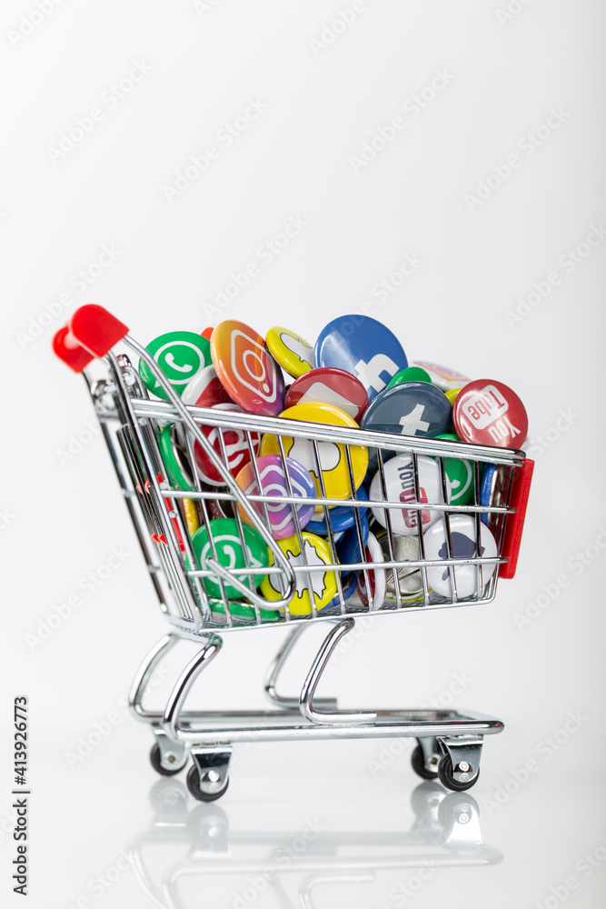 Shopping cart with social media logos from facebook, instagram, youtube and  whatsapp symbolizes the business with users Stock Photo | Adobe Stock