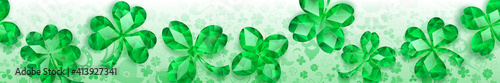 Banner on St. Patrick's Day made of crystal clover leaves and other symbols  in light green colors with seamless horizontal repetition