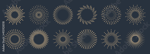 Vintage sunburst collection. Bursting golden sun rays. Fireworks. Logotype or lettering design element. Radial sunset beams. Vector illustration.