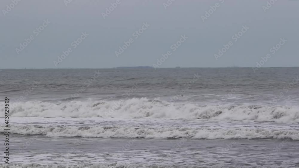 Rough Ocean waves in Winter with grey overcast conditions. Static Medium shot Rough Ocean waves in Winter with grey overcast conditions. Static Medium shot