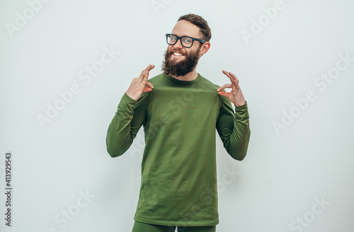 Portrait of handsome guy wearing thermal underwear isolated on white photo