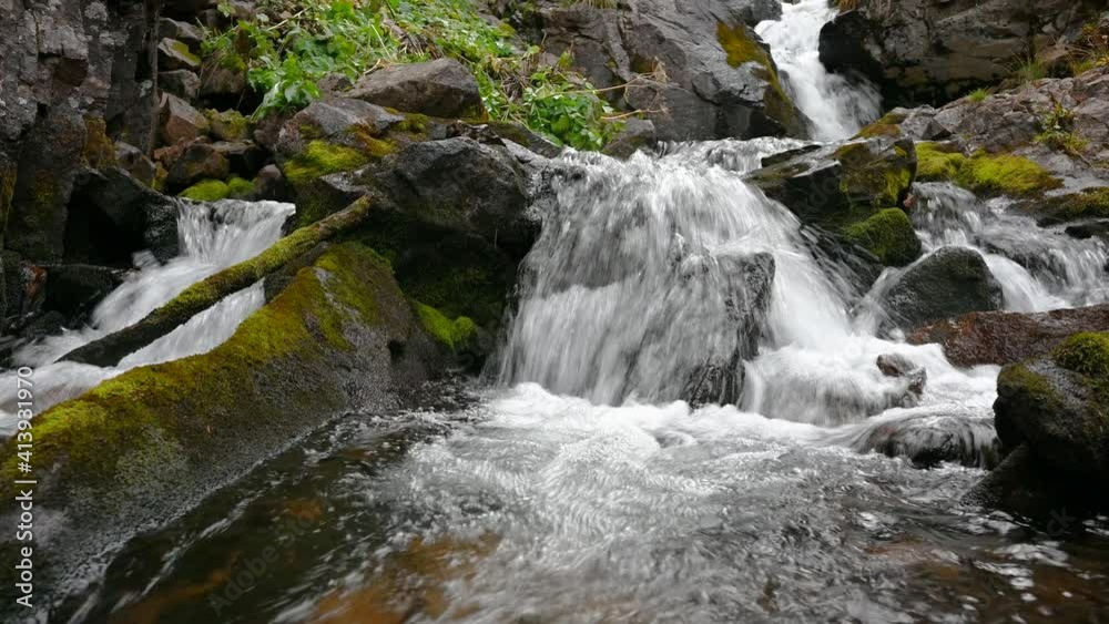Peaceful flowing cascade in Rocky Mountain National Park Peaceful flowing cascade in Rocky Mountain National Park