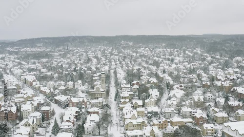 Drone Aerial of the university city Göttingen after snow storm tristan in the winter of 2021. Gottingen is a typical german town in Lower Saxony in Germany, Europe. photo