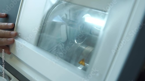 Wallpaper Mural Ophtalmologist with a lens - Medical tool Torontodigital.ca