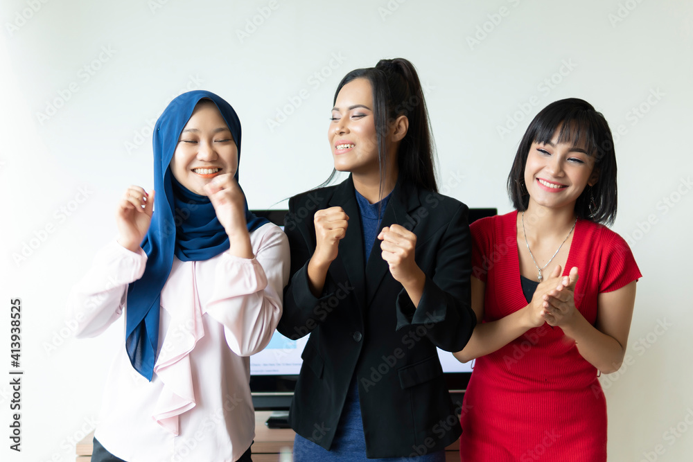 Home Office Concept, Group of diverse people standing and cheering up Home Office Concept, Group of diverse people standing and cheering up