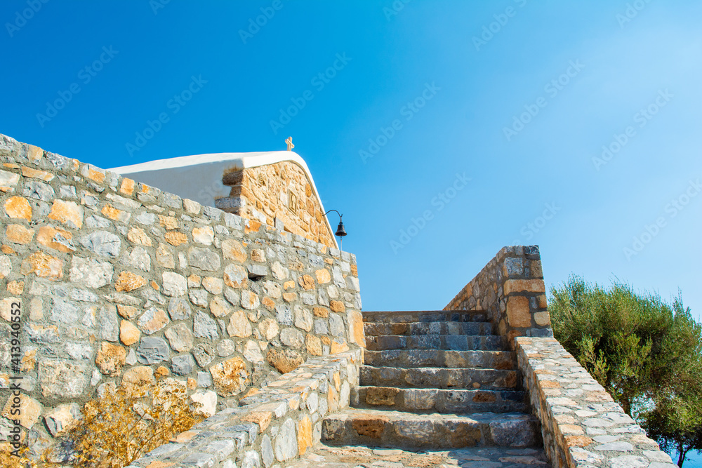 Small traditional Greek church on the top of mountain Small traditional Greek church on the top of mountain