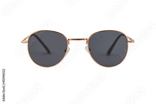 Square sunglasses with round bottom, black clear lenses and thin golden wrap around frames isolated on white background. Front view.