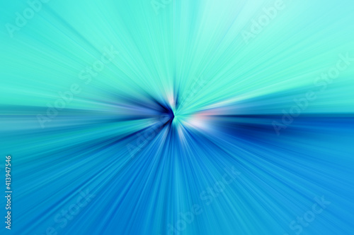 Abstract radial zoom blur surface in turquoise and blue tones. Abstract bicolor background with radial, diverging, converging lines. 