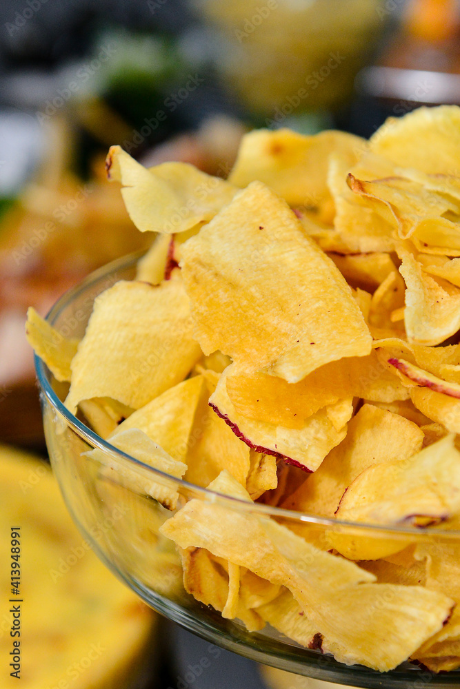 potato chips in a bowl, fried manioc, fries potato chips in a bowl, fried manioc, fries