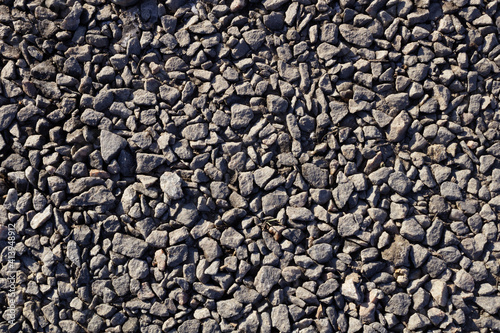 small gray stones completely cover the ground