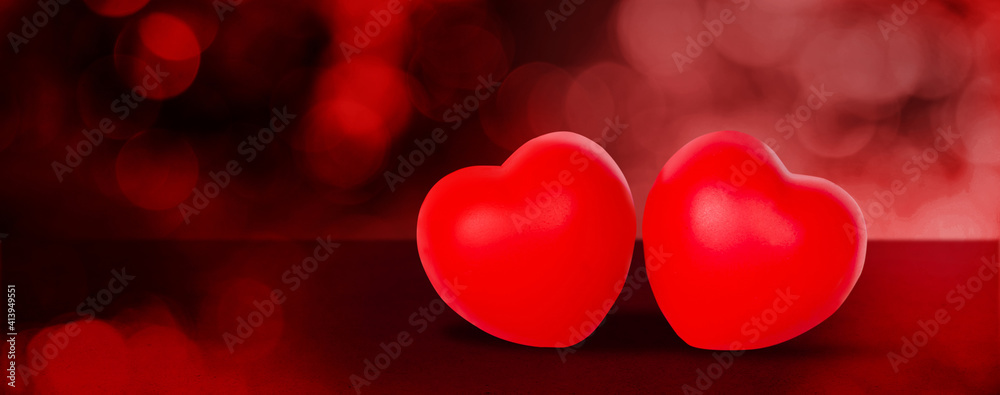 Two Heart shape on red bokeh background, abstract with glitter glowing, February 14 Valentine day, symbol of love and anniversary with romantic, couple sign with romance, nobody, holiday concept. Two Heart shape on red bokeh background, abstract with glitter glowing, February 14 Valentine day, symbol of love and anniversary with romantic, couple sign with romance, nobody, holiday concept.