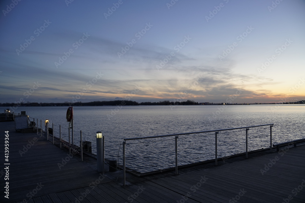 Beautiful Sunset at a Pier with Waterfront Views