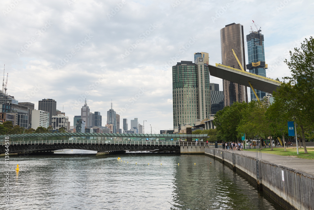 Naklejka premium The many high rise buildings in the city of Melbourne in the late afternoon light, Australia on Dec 26th, 2019.