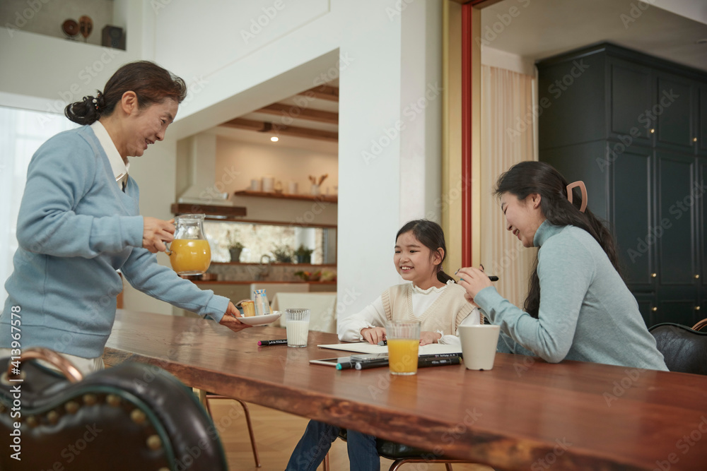 happy young female people eating croissant and drinking coffee and juice happy young female people eating croissant and drinking coffee and juice